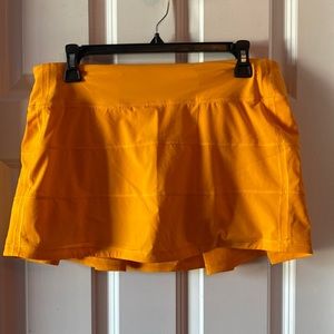 Lululemon orange pace rival skirt size 8